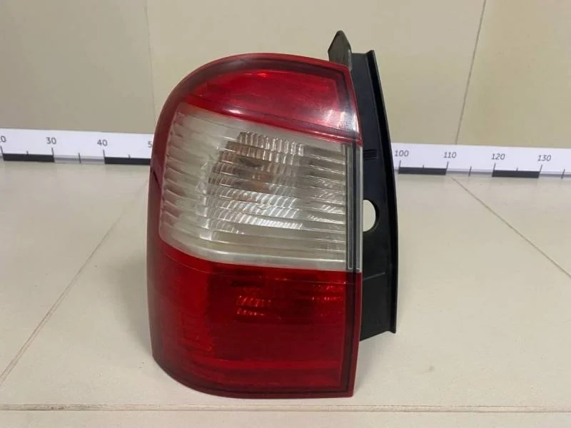 Фонарь задний наружный левый Nissan Terrano (D10) 2014>