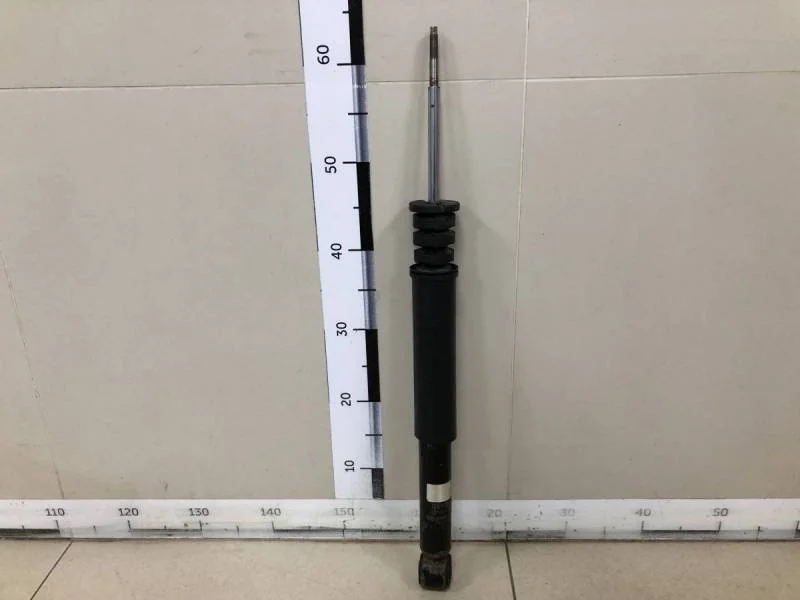 Амортизатор задний Nissan Note (E11) 2006-2013