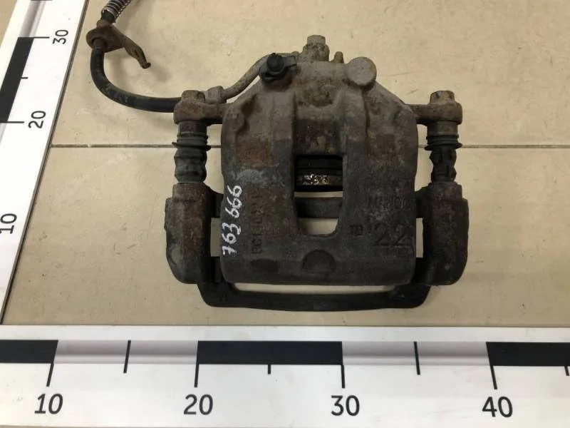 Суппорт передний правый Kia Rio 3 (UB) 2011-2017