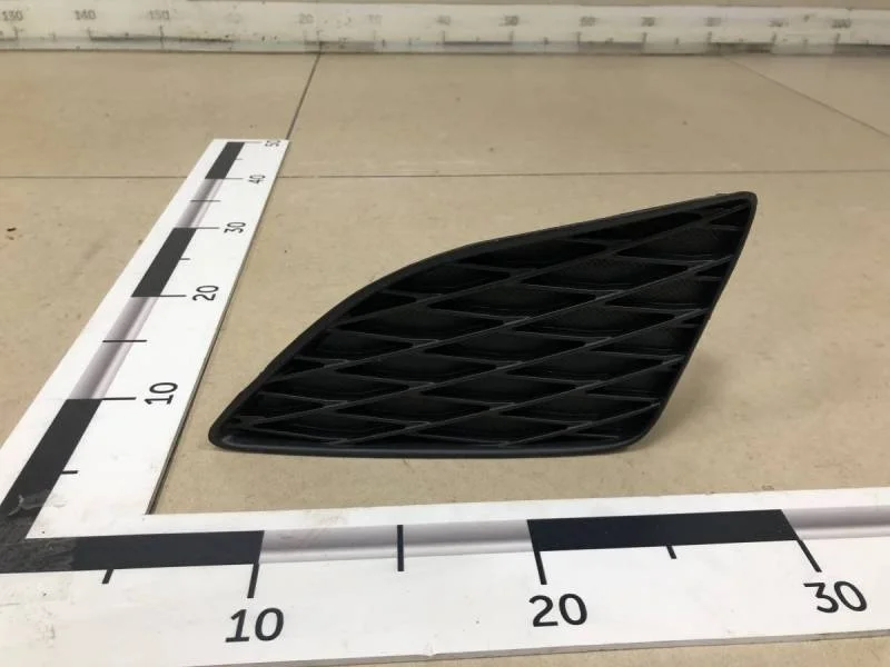 Решетка в бампер левая Toyota Corolla E150 2006-2013