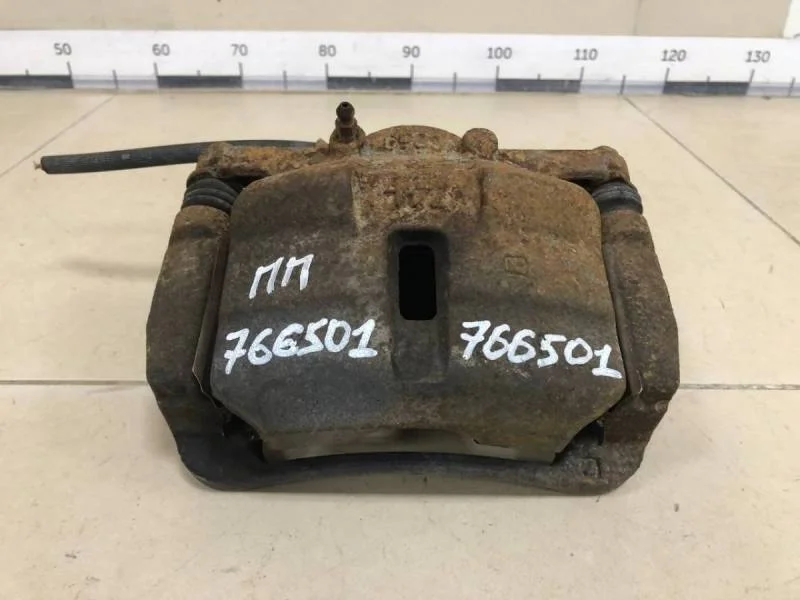 Суппорт передний правый Nissan X-Trail (T31) 2007-2014