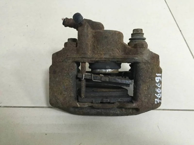 Суппорт задний левый Mitsubishi Pajero/Montero Sport (KH) 2008-2015