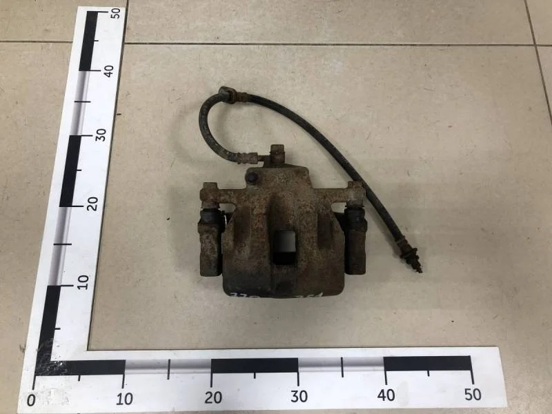 Суппорт передний левый Suzuki Grand Vitara 2005-2015