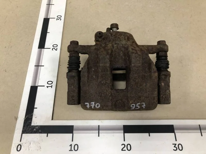 Суппорт передний левый Suzuki Grand Vitara 2005-2015