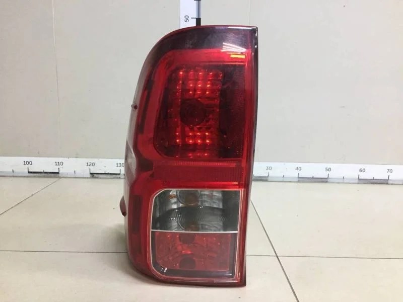 Фонарь задний левый Toyota Hilux 2015>