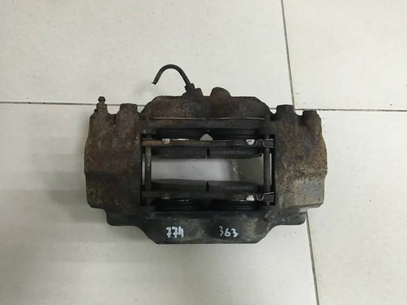 Суппорт передний левый Toyota Land Cruiser Prado (J150) 2009>