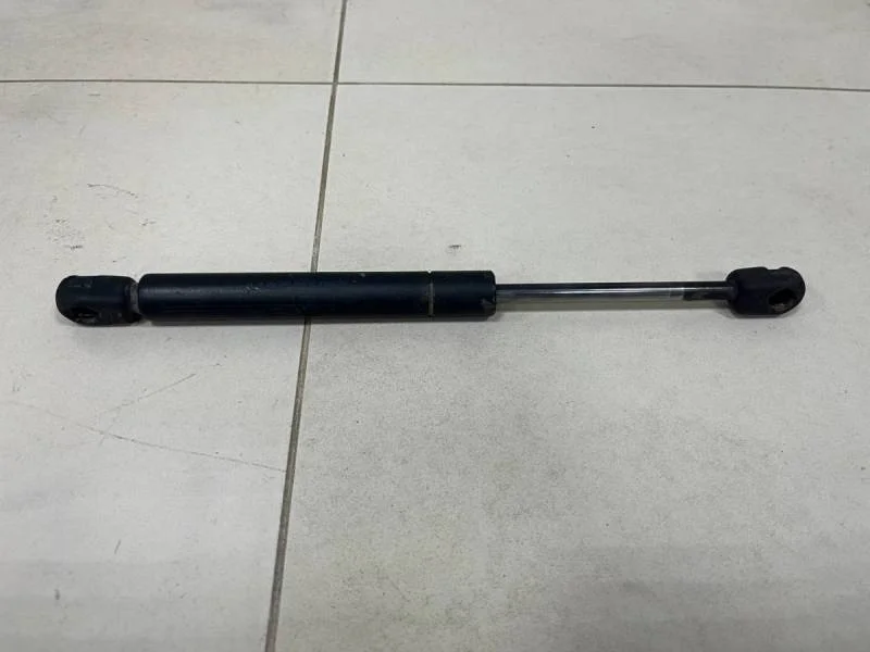 Амортизатор крышки багажника Volkswagen Passat B5 2000-2005