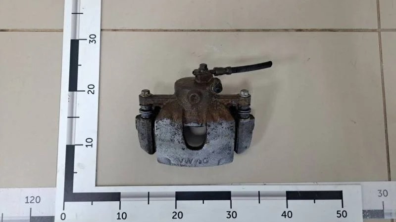 Суппорт передний левый Volkswagen Polo (Sed RUS) 2011>