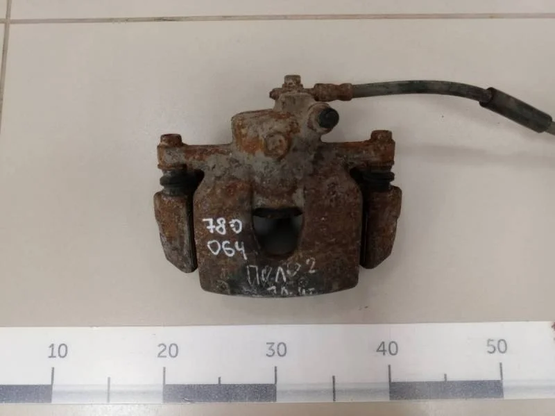 Суппорт передний левый Volkswagen Polo (Sed RUS) 2011>