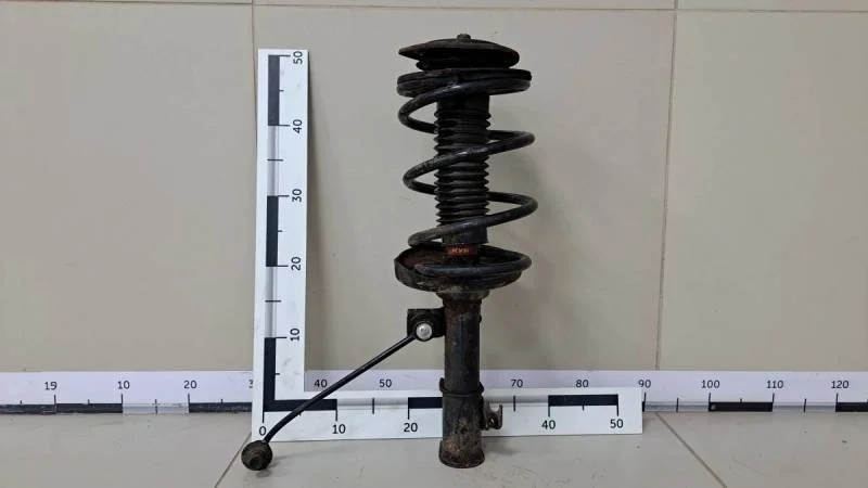 Амортизатор передний Suzuki Liana 2001-2007