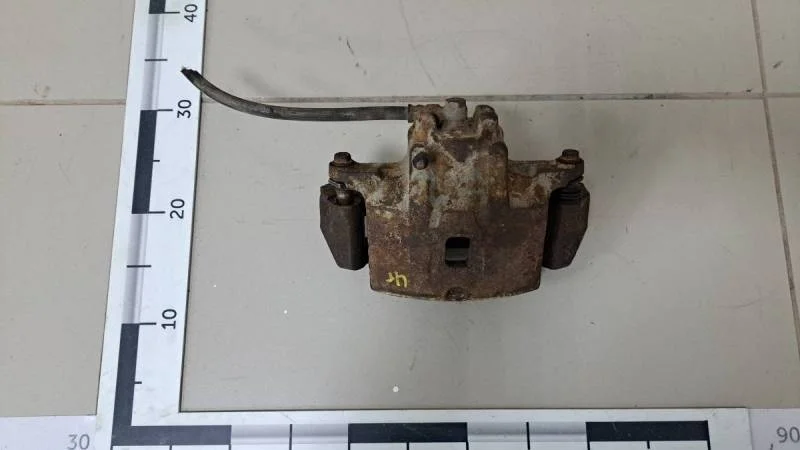 Суппорт передний правый Mitsubishi Lancer 9  (CS/Classic) 2000-2011