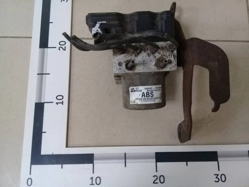 Блок ABS (насос) Kia Cerato (TD) 2009-2013