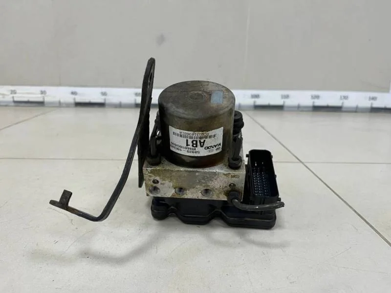 Блок ABS (насос) Kia Cerato (TD) 2009-2013