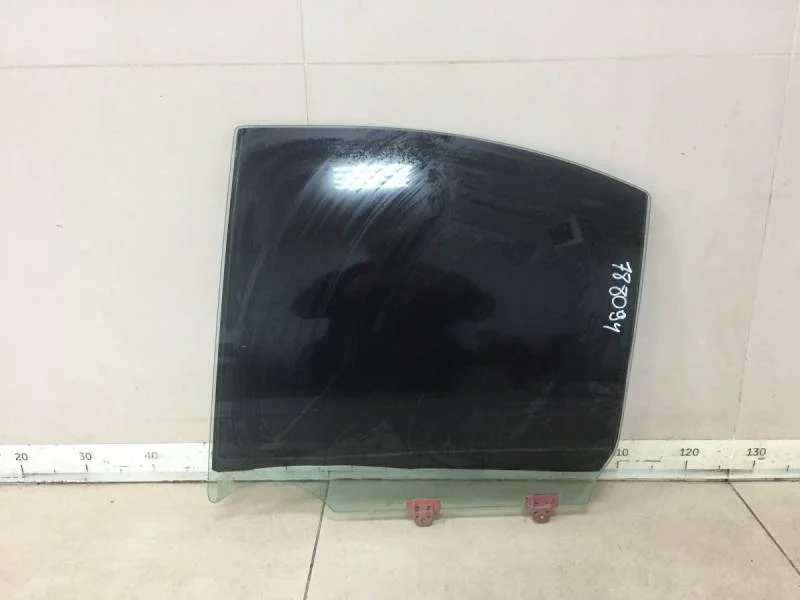 Стекло двери задней левой Nissan Almera (N16) 2000-2006