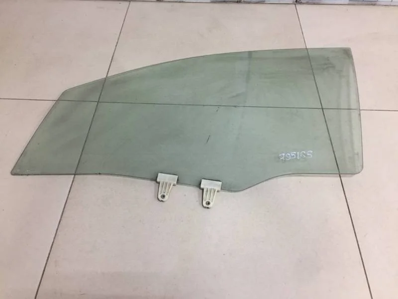 Стекло двери передней левой Suzuki Liana 2001-2007