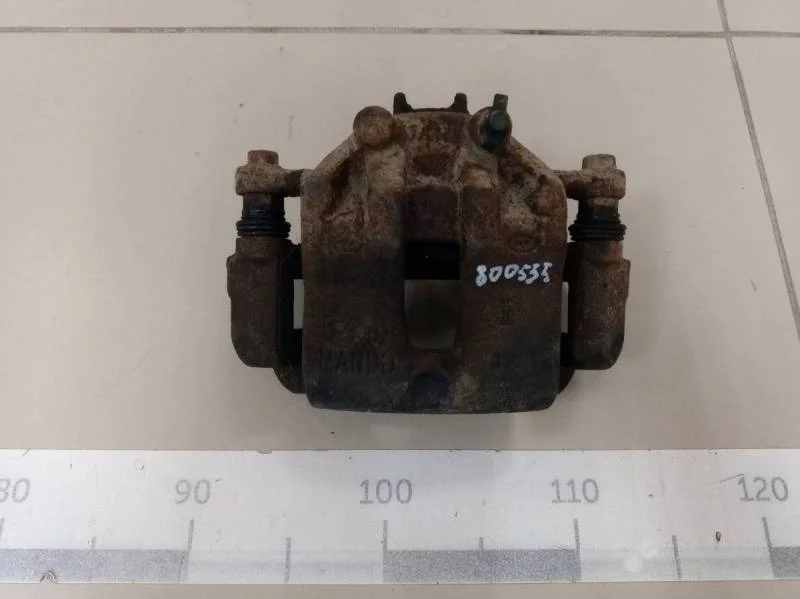 Суппорт передний левый Kia Rio 3 (UB) 2011-2017