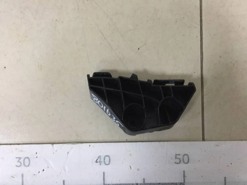 Кронштейн заднего бампера левый Toyota Corolla E150 2006-2013