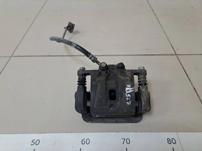 Суппорт задний правый Kia Sorento (XM) 2009>