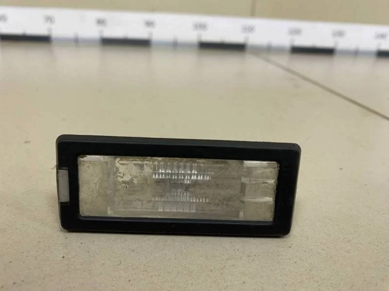 Фонарь подсветки номера Renault Duster 2012>