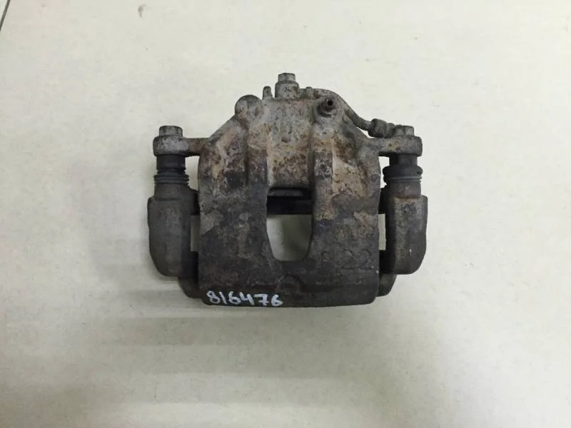 Суппорт передний левый Kia Rio 3 (UB) 2011-2017