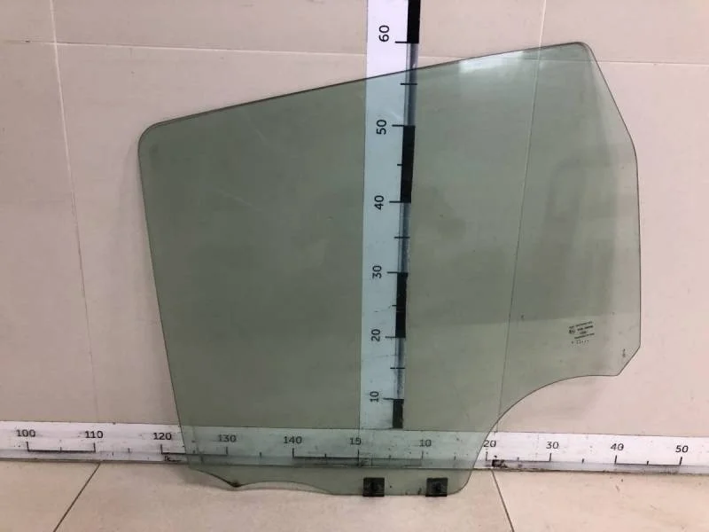 Стекло двери задней левой Renault Duster 2012>