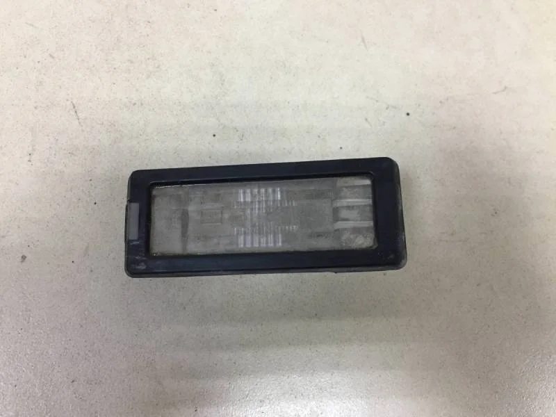 Фонарь подсветки номера Renault Fluence 2010-2017