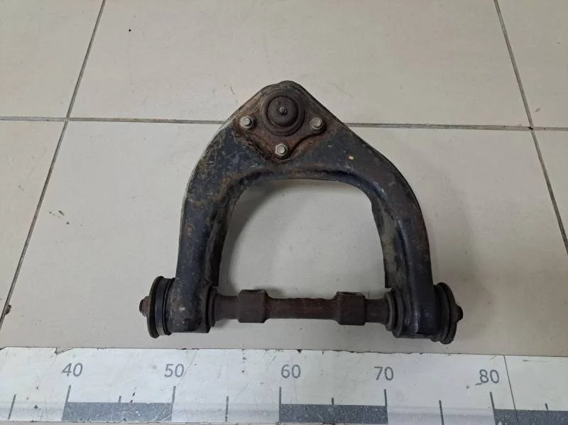 Рычаг передний верхний левый Mitsubishi L200 (K6,K7) 1996-2006