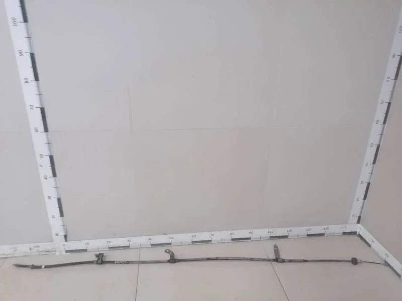 Трос стояночного тормоза левый Kia Rio 3 (UB) 2011-2017