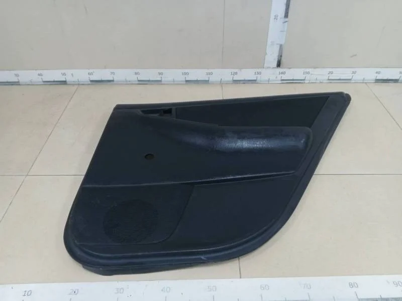 Обшивка двери задней правой Toyota Corolla E120 2001-2007