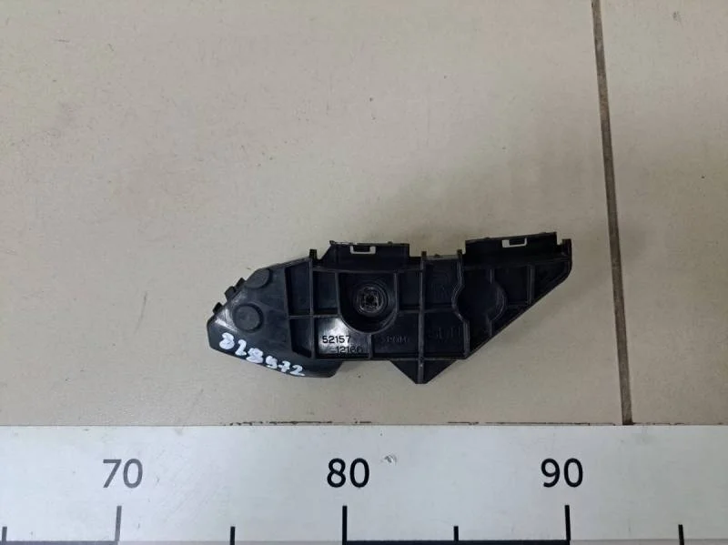 Кронштейн заднего бампера правый Toyota Corolla E150 2006-2013