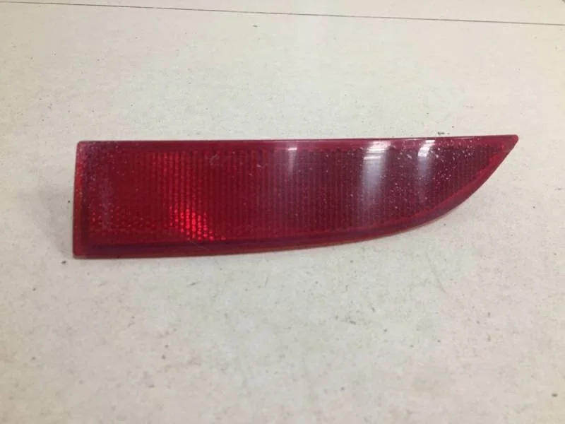 Отражатель в бампер задний левый Renault Logan (2) 2014>