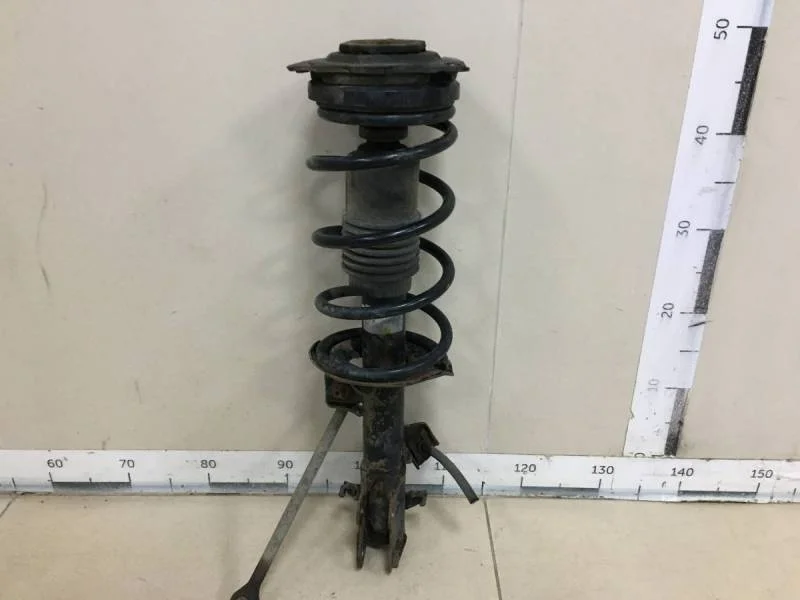 Амортизатор передний правый Nissan Tiida (C11) 2007-2014