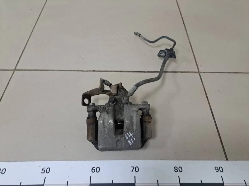 Суппорт задний левый Hyundai i30 (GD) 2012>