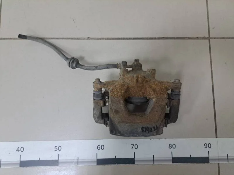 Суппорт передний правый Chevrolet Aveo T300 2011>