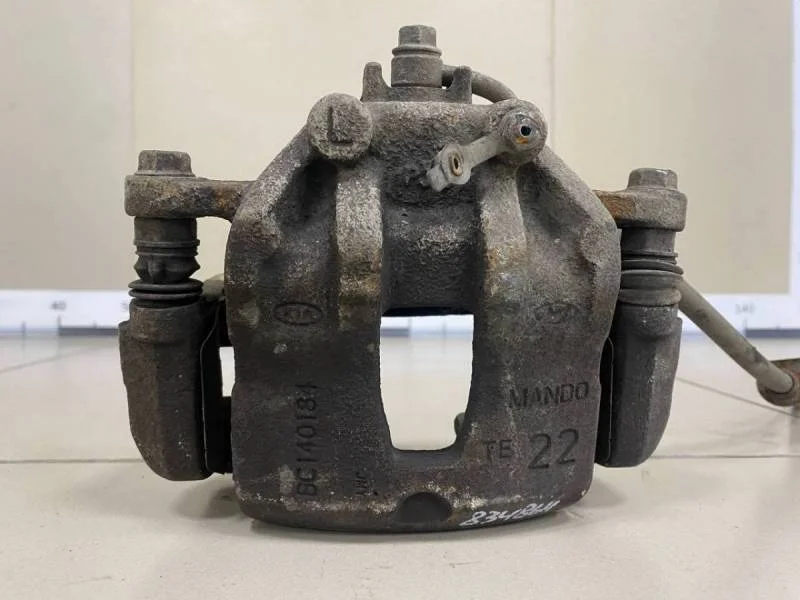 Суппорт передний левый Kia Rio 3 (UB) 2011-2017