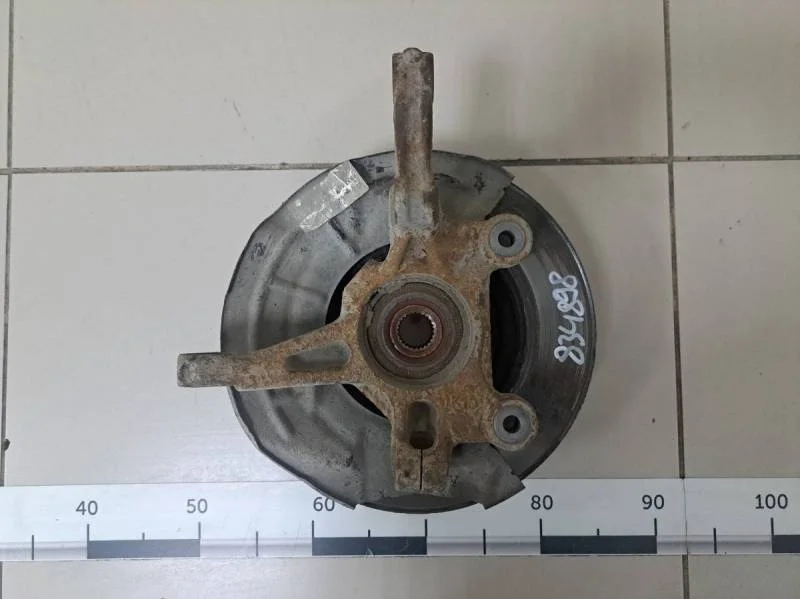 Кулак поворотный передний левый Chevrolet Aveo T300 2011>