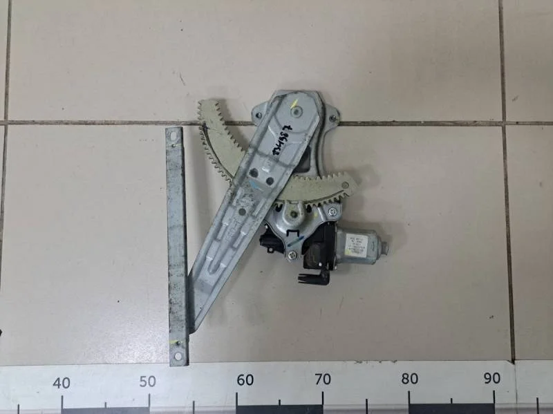 Стеклоподъемник электр. задний левый Nissan Tiida (C11) 2007-2014