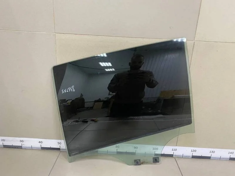 Стекло двери задней левой Renault Sandero 2014>