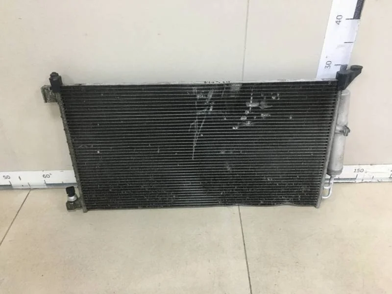 Радиатор кондиционера (конденсер) Nissan Tiida (C11) 2007-2014