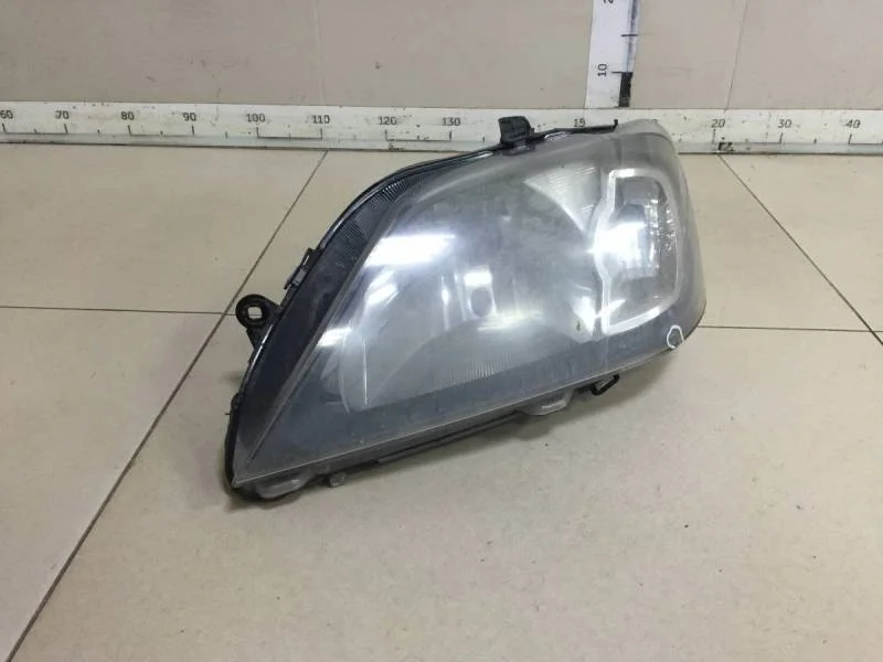 Фара левая Renault Logan (1) 2005-2014