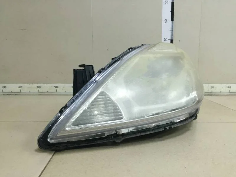 Фара левая Nissan Tiida (C11) 2007-2014