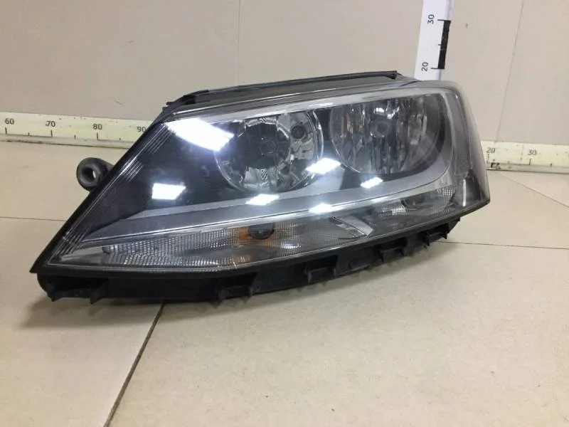 Фара левая Volkswagen Jetta (5K) 2011>