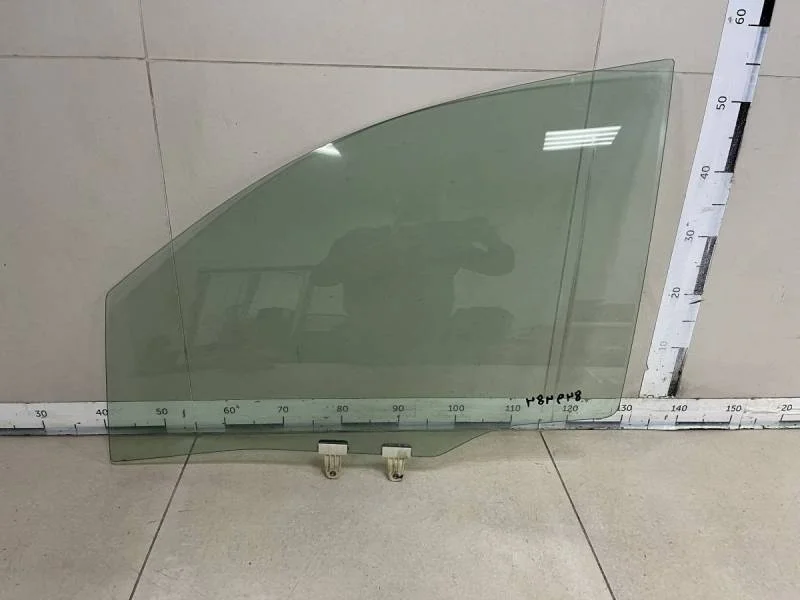 Стекло двери передней левой Suzuki Liana 2001-2007