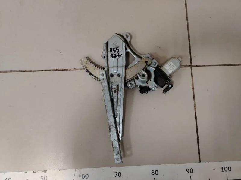 Стеклоподъемник электр. задний левый Nissan Tiida (C11) 2007-2014
