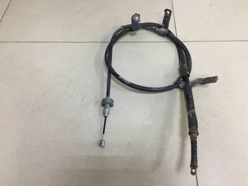 Трос стояночного тормоза левый Kia Ceed (JD) 2012-2018