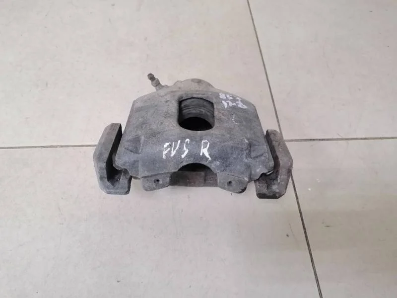 Суппорт передний правый Ford Fusion (JU) 2002-2012