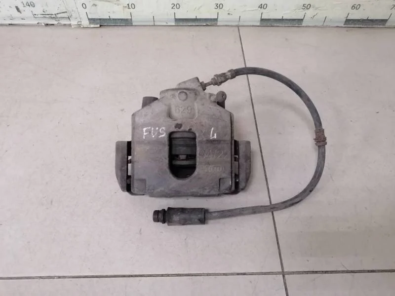 Суппорт передний левый Ford Fusion (JU) 2002-2012