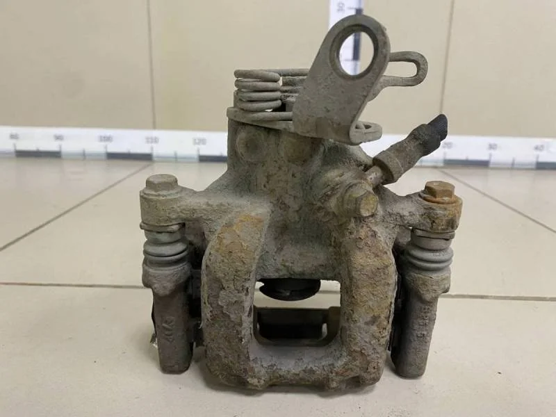 Суппорт задний левый Skoda Octavia (A5 1Z-) 2004-2013