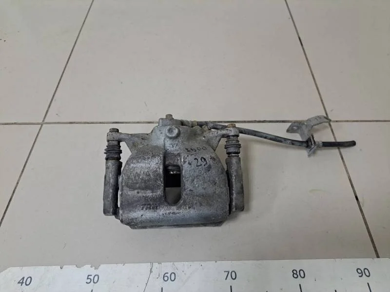 Суппорт передний левый Skoda Octavia (A7) 2013>