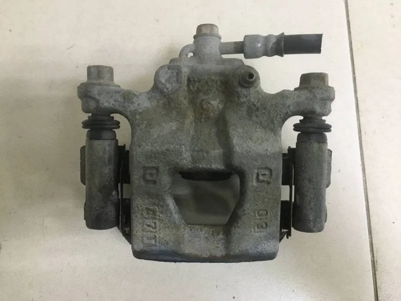 Суппорт задний правый Nissan Sentra (B17) 2013-2017